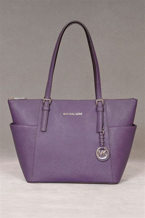 purple michael kors purse outlet.